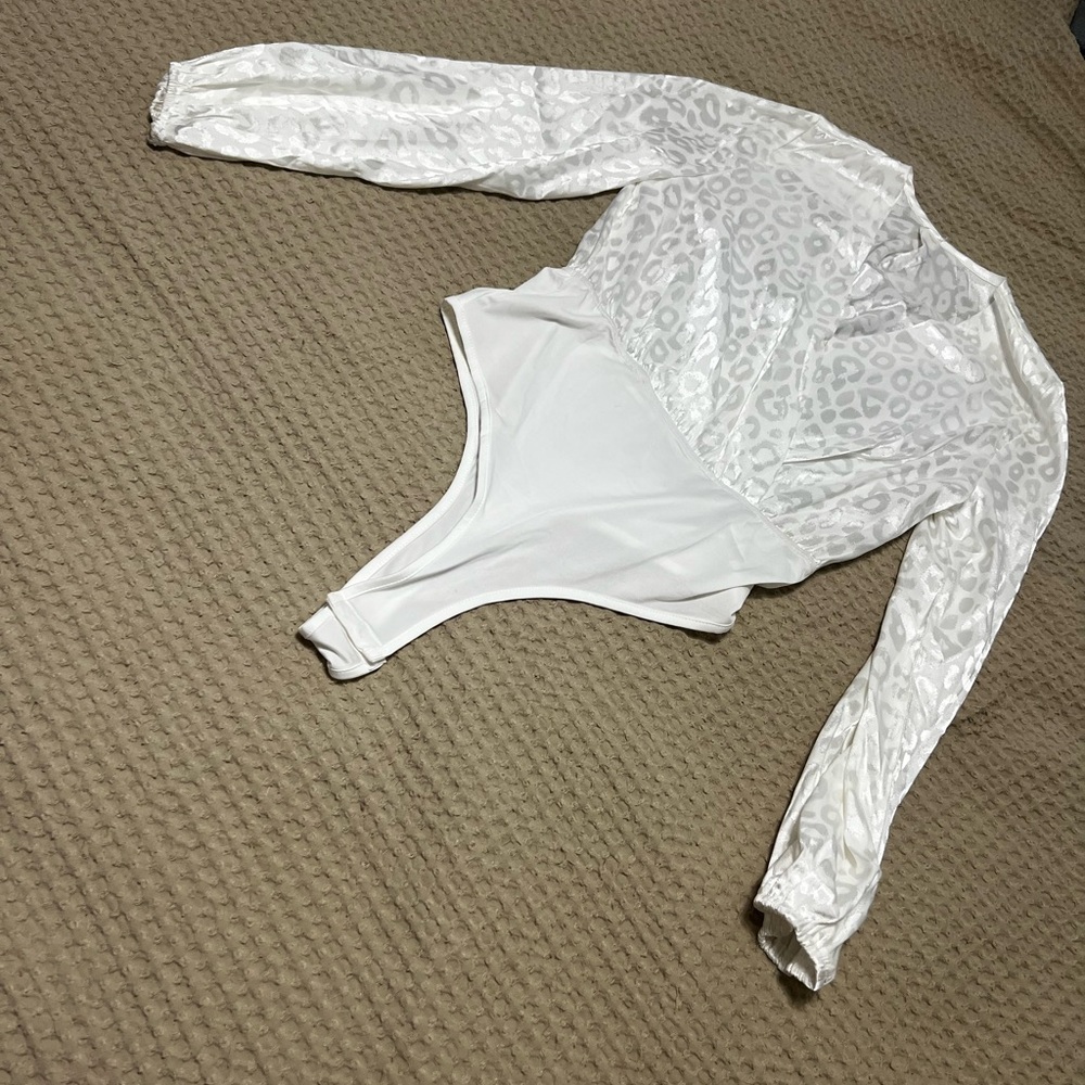 Bodysuit new without tags, never worn.